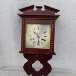 Wooden vintage wall clock