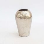 Hammered metal vase