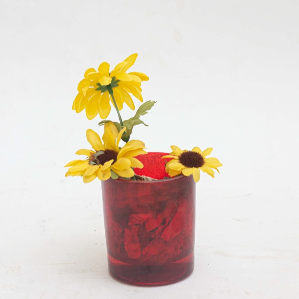 Red vase with sunflower