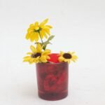 Red vase with sunflower