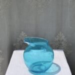 Turquoise glass vessel