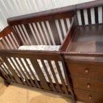 Wooden brown baby cot
