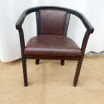 Brown leather armchair
