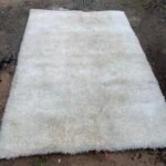 Off white fur rug