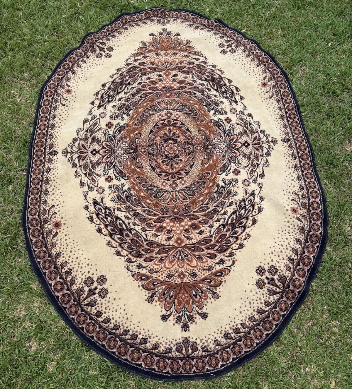 Oval Shaped Rug - Image 1