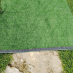 Synthetic grass mat